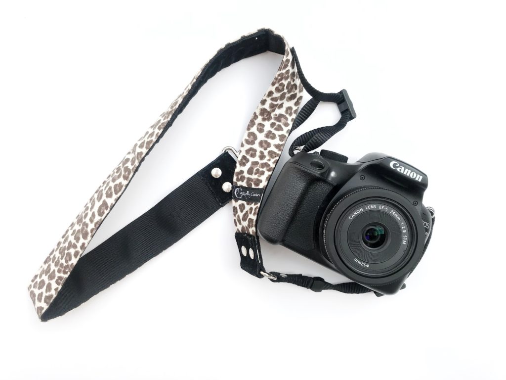 canon camera with leopard camera strap