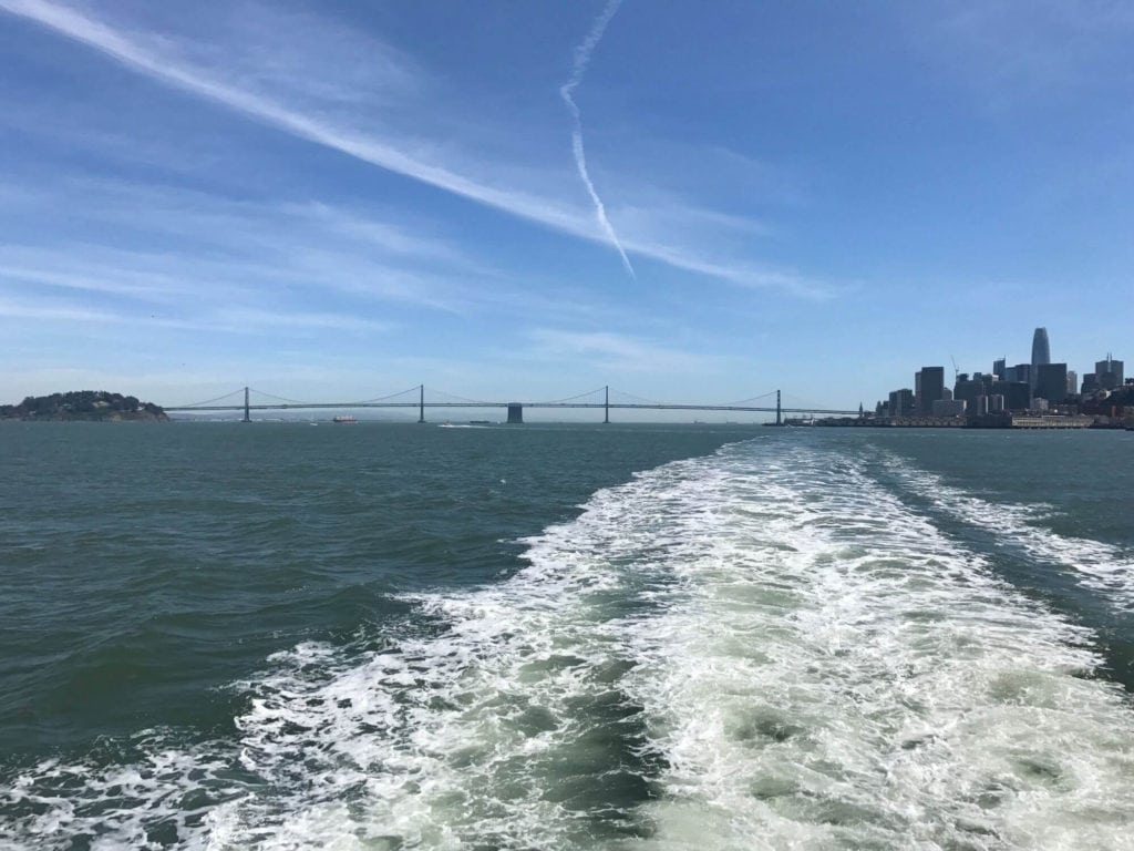 ocean with bridge & city in the background