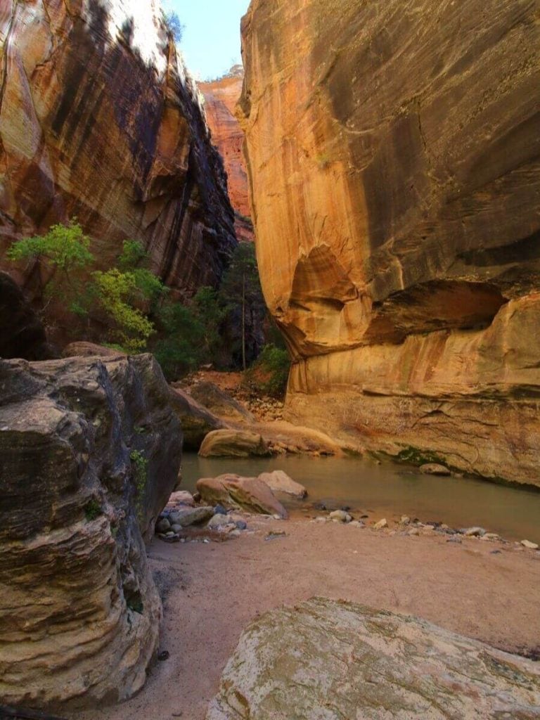 large rocks between canyon walls with the river running between them